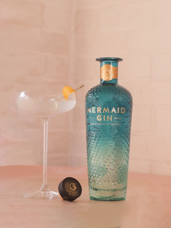 Mermaid Gin Martini With A Citrus Lemon Garnish